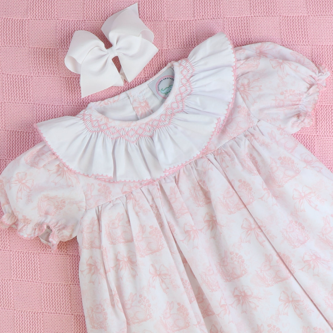 Smocked Ruffle Neck Dress- Pink Bunny Toile Smocked Ruffle Neck Dress- Pink Bunny Toile
